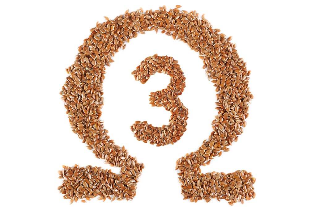 simbolo omega 3 hecho con semillas de lino