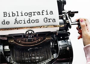 maquina antigua de escribir con texto escrito bibliografia de acidos grasoso